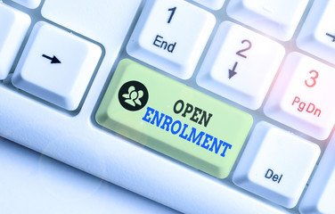 Conceptual hand writing showing Open Enrolment. Concept meaning period during which members can...