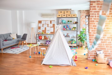 Picture of preschool playroom with colorful furniture, and toys around empty kindergarten © Krakenimages.com