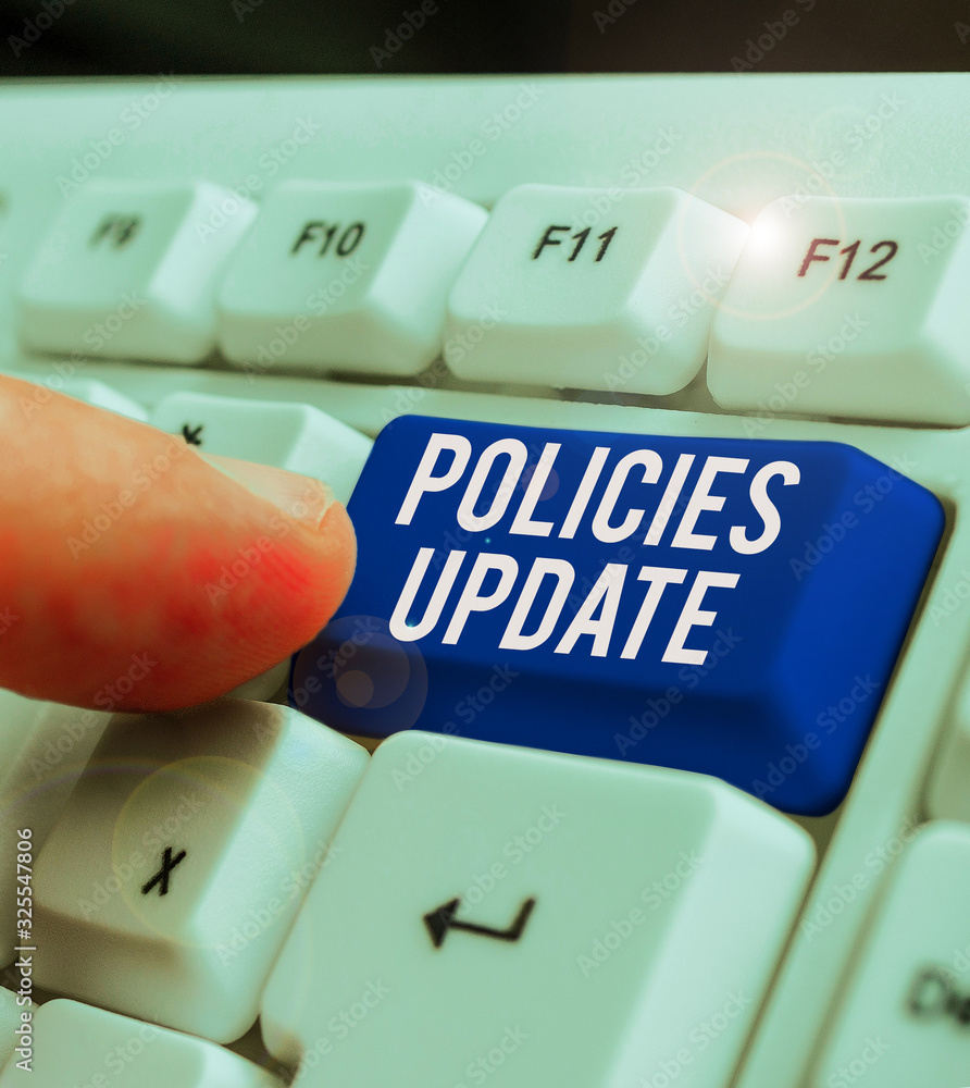Poster conceptual hand writing showing policies update. concept meaning act of adding new information or gu