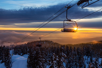 Seymour Mountain, North Vancouver, British Columbia, Canada. Chairlift going up to the top of a ski...