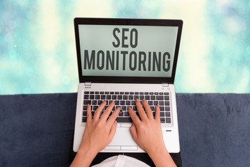Conceptual hand writing showing Seo Monitoring. Concept meaning the process of optimizing the...