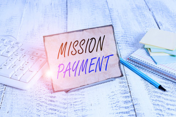 Conceptual hand writing showing Mission Payment. Concept meaning Compensation Discharge or...