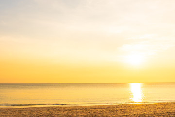 Beautiful tropical nature beach sea ocean at sunset or sunrise