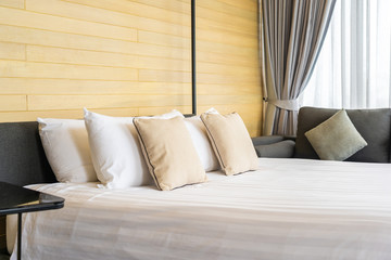 White comfortable pillow on bed decoration interior of bed room