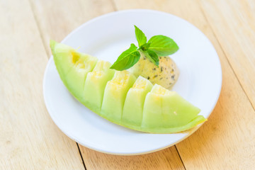 ice cream melon on wood table