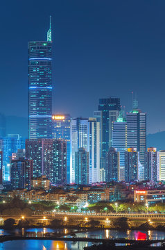 Skyline Of Shenzhen City, China At Night. Viewed From Hong Kong Border