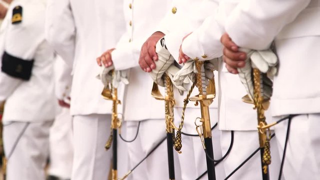 Detail hand shot of sailors during official ceremony at Navio Escola Sagres in Rio de Janeiro, Brazil.