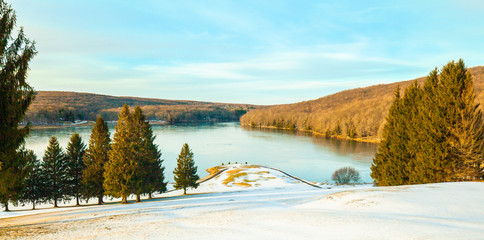 Winter landscape with lake and trees