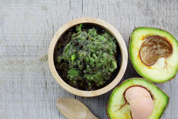 Avocado on wooden.
