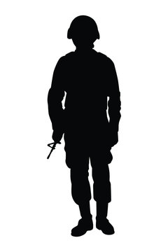 Standing soldier with weapon silhouette vector