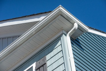 Colonial white gutter guard system, fascia, drip edge, soffit providing ventilation to the attic,...