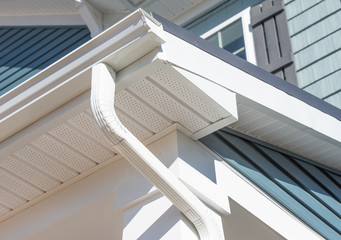 Colonial white gutter guard system, fascia, drip edge, soffit providing ventilation to the attic,...