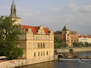 Fototapeta premium Prague, Czech Repub., Buildings Along the Vltava