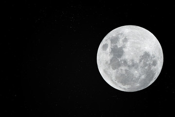 Fototapeta na wymiar Full moon with many real stars in the dark night.