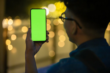 man use green screen phone