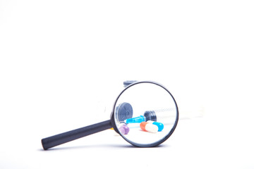 Magnifier and drug capsule