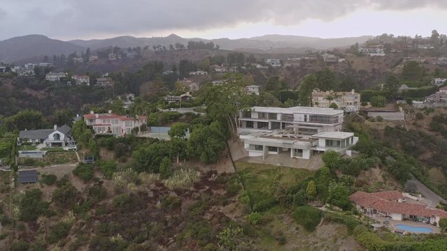 Los Angeles Aerial v274 Panning around close up to high around hillside mansion residential neighborhood - October 2019