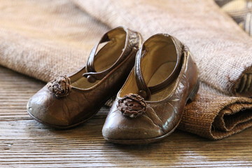 childs old leather brown shoes