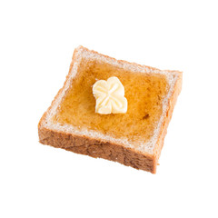 bread or bread slice with honey butter on a background new.