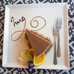 top view Tiramisu on chocolate cake