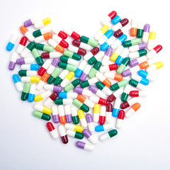 Drug capsule on white background