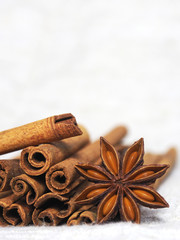 cinnamon and poder on white and macro style spice cooking