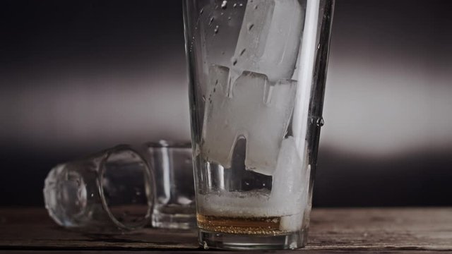 drunk driving concept with empty beer glass and police lights flashing