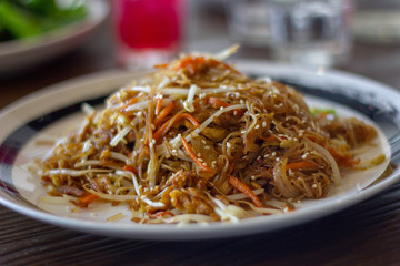Fried vegetarian noodles with egg and tofu