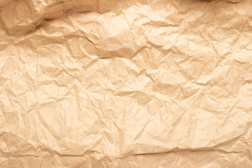 Crumpled brown craft paper. Texture, banner. Can be used as background. Top view, flat lay