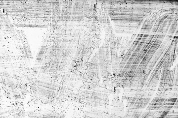 Texture of a concrete wall with cracks and scratches which can be used as a background