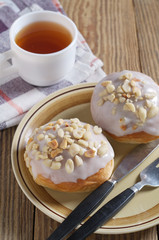 Glazed peanut buns and tea