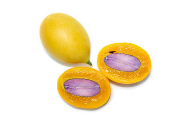 Top view of ripe marian plum or plum mango Cut in half this is Thai fruit in studio shot on white background
