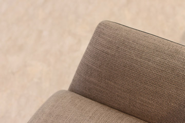Close up detail of gray fabric sofa with in living room