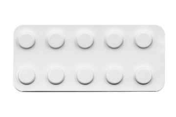 Pills in white blister pack isolated on white background. Global pharmaceutical industry. Closeup,...
