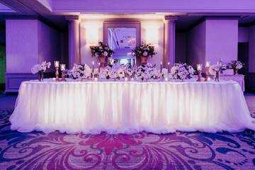 Luxurious dinner hall arranged for rich wedding party