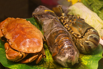 fresh crabs and lobster as background