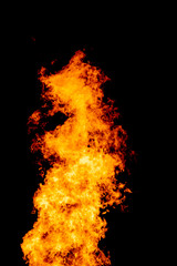 Yellow red and orange fire flames blazing fiery burning isolated on a black background