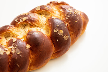 Easter greek tsoureki braid, sweet bread brioche isolated on white
