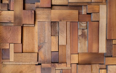 Varnished wooden blocks and strips  randomly  assembled, in relief. Home decor, abstract  background