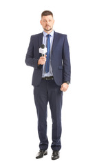 Obraz premium Male journalist with microphone on white background