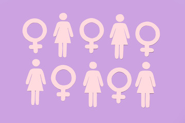 Many female figures and symbols of woman on color background. Concept of feminism