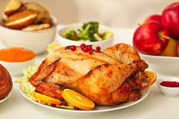 Tasty baked turkey for Thanksgiving day on table