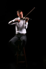 Young men playing the violin