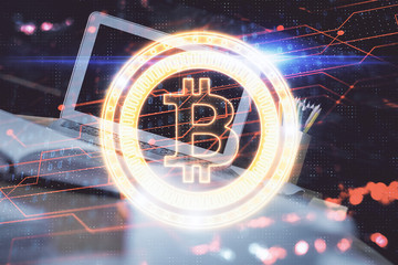 Double exposure of blockchain theme hologram and table with computer background. Concept of bitcoin...