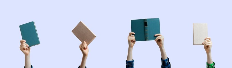 group of raised people hands holding books isolated against the colorful background, share...