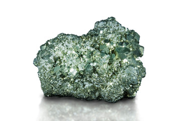 A close up of iron pyrite mineral isolated on dark/white background. 