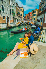 couple having date at pier with beautiful view of venice canal © phpetrunina14