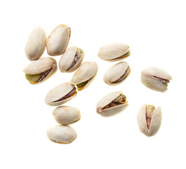 Ripe pistachios nuts isolated on a white background