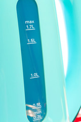 modern green electric kettle, isolated on white background  - Image