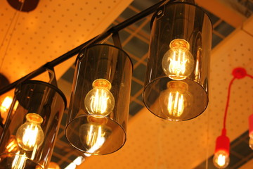 modern chandelier with incandescent lamps